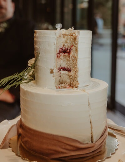 Two-tiered wedding cake with fruit layers inside
